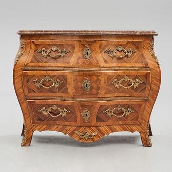 A rosewood-veneered and ormolu-mounted Rococo chest of drawers by J. Wahlbeck (master 1760-1782).