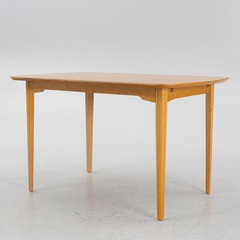 An elm-veneered dining table, Nordiska Kompaniet, Sweden, 1955.