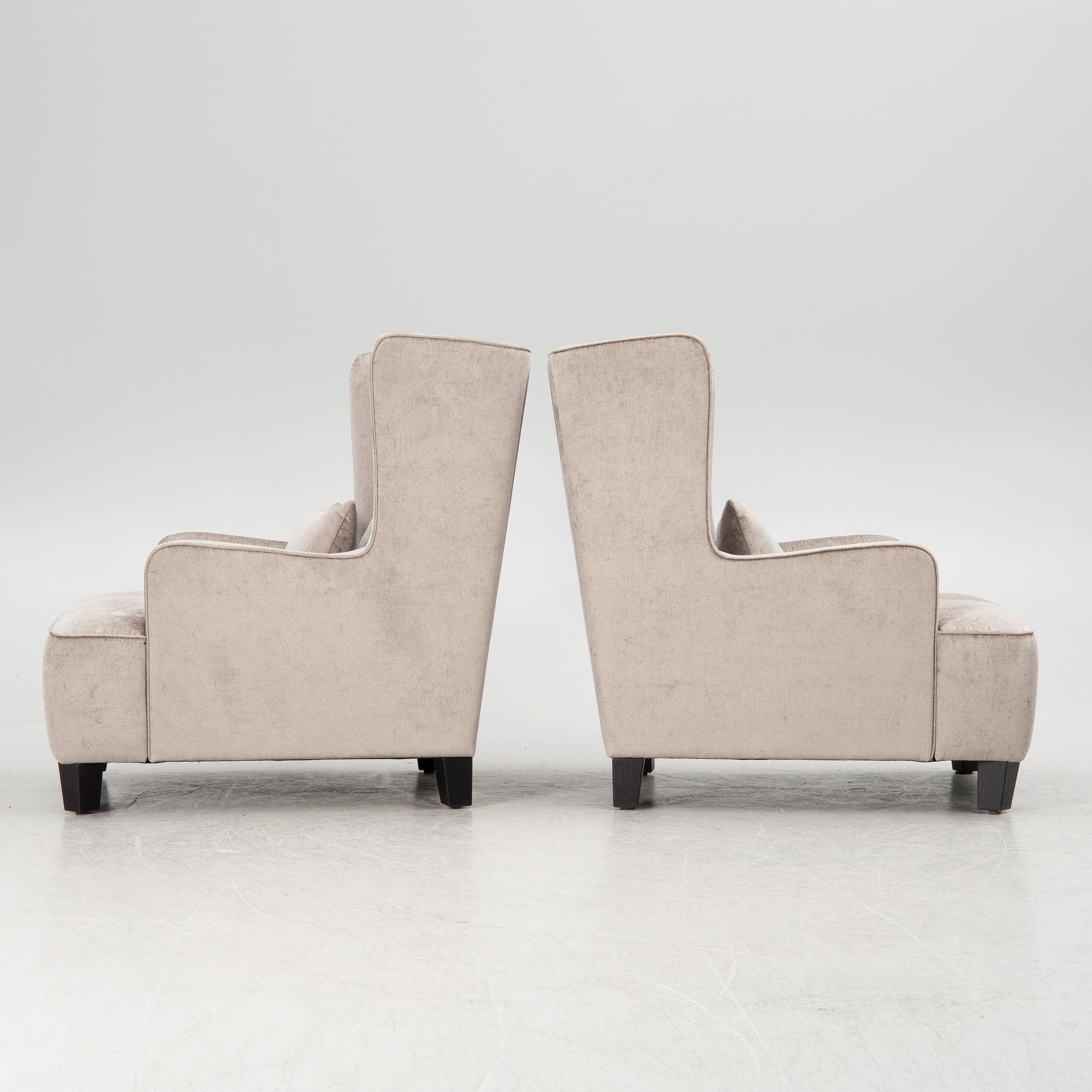 A pair of easy chairs, 21st century.