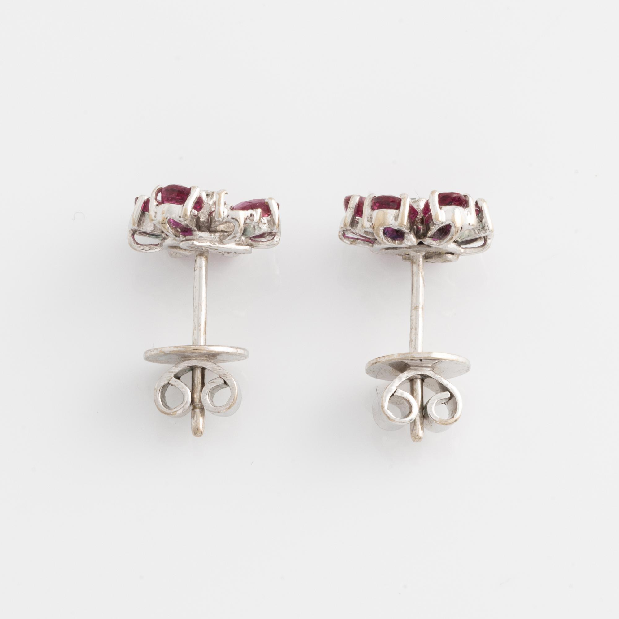 Earrings, one pair, white gold with rubies and small diamonds.