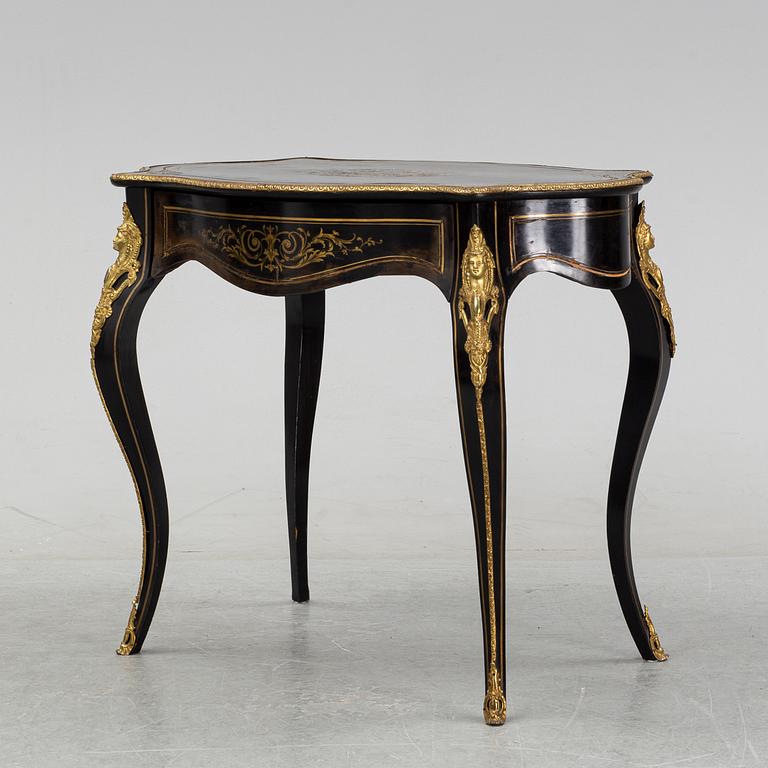 A Louis XV style table, early 20th Century.