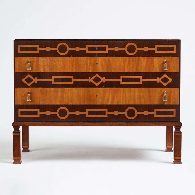 Axel Einar Hjorth, a iaspis and palisander chest of drawers  'Library' by Nordiska Kompaniet, Sweden 1929.