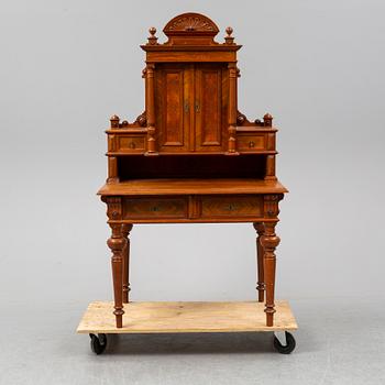 A late 19th century walnut veneered desk.