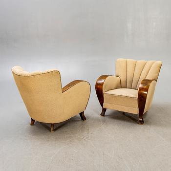 A pair of Art Deco armchairs.