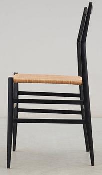 A Gio Ponti 'Superleggera' chair, Cassina, Italy, black painted ash with ratten seat.