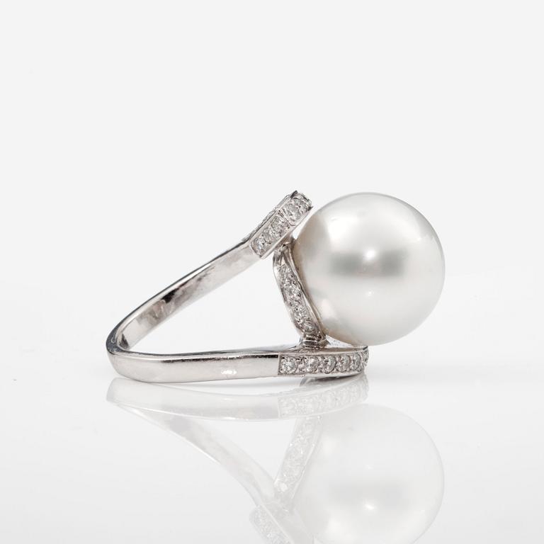 A cultured South sea pearl and brilliant-cut diamond ring. Total carat weight of diamonds circa 1.50 cts.