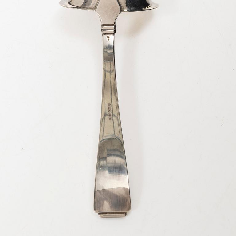 Gustaf Möllenborg, a silver bowl, Stockholm 1851, six silver punch cups, including CG Hallberg, and a silver spoon.