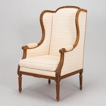 An armchair, Bergère, Louis XVI style, early 20th century.