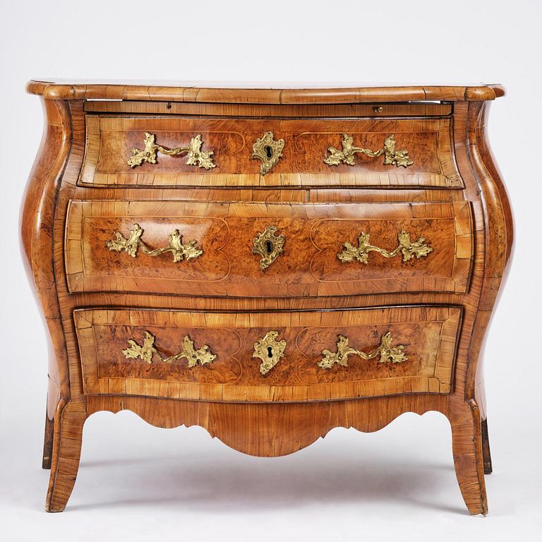 A burr alder parquetry rococo commode, Mälardalen, Sweden, later part 18th century.
