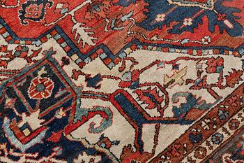 An antique Heris/Karadja carpet, approximately 501 x 339-353 cm.