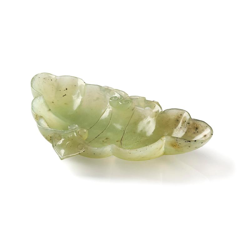 A carved nephrite ink palette, Qing dynasty.