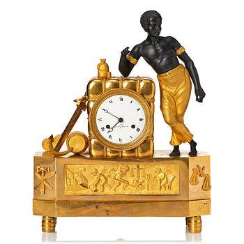 109. A Swedish Empire mantel clock by G. Undén.