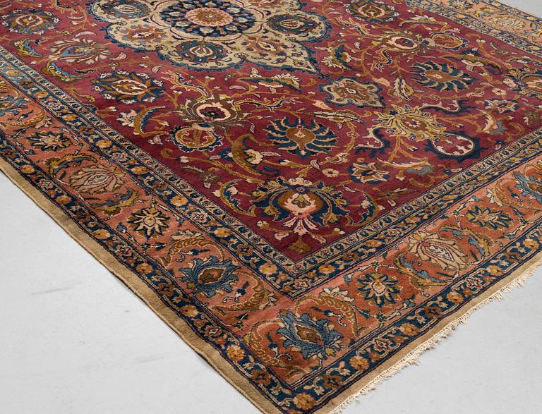 A carpet, semi-antique Tabriz, ca 357,5 x 256 cm.