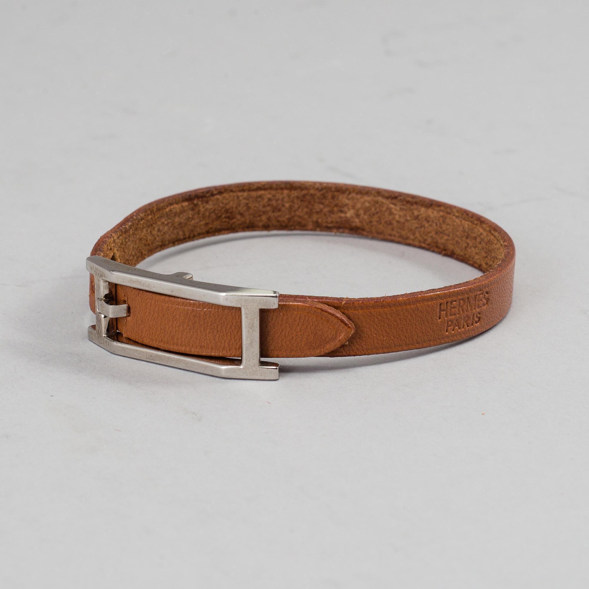 HERMÈS, a scarf and a bracelet.