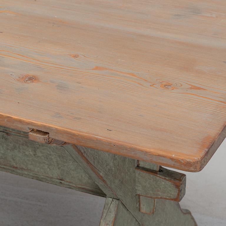 A 19th Century painted pine table.