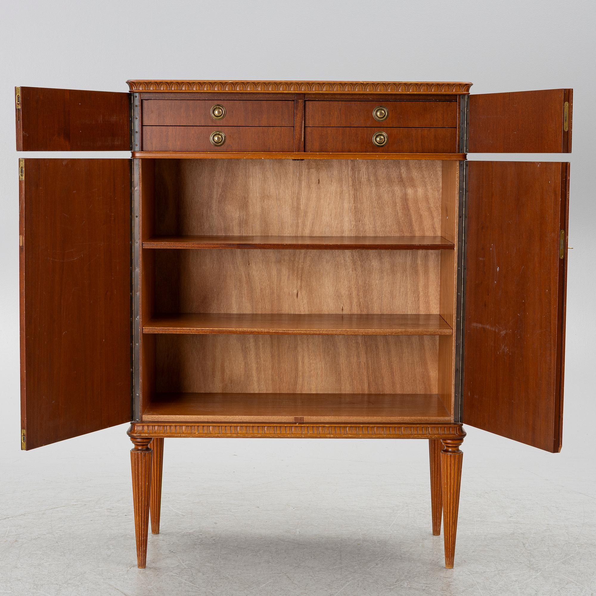 A cabinet, around the mid-20th century.