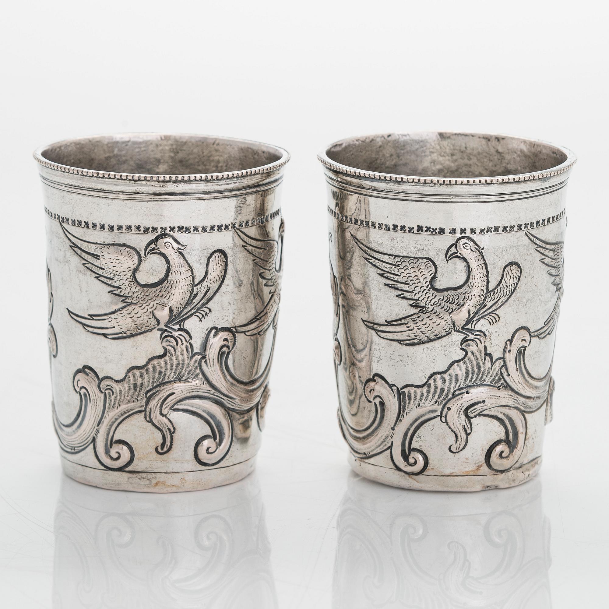 A pair of late 18th-century silver beakers, unknown maker's mark, alderman Alexei Kosirev, Moscow 1791.