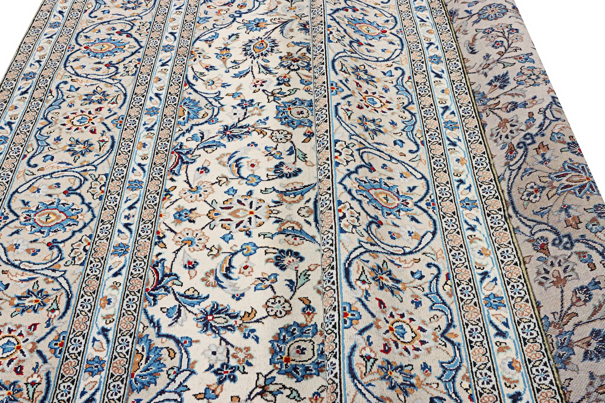 A Kashan carpet, c. 355 x 238 cm.