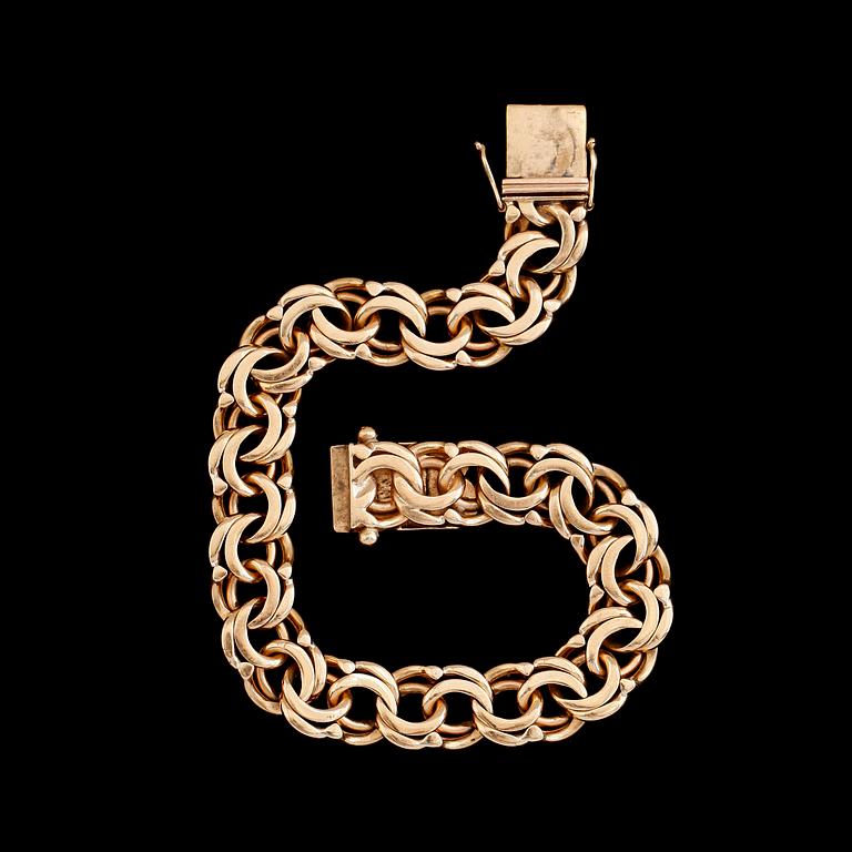ARMBAND, 18 k guld, bolidenguld, 1947. Total vikt ca 31 g.