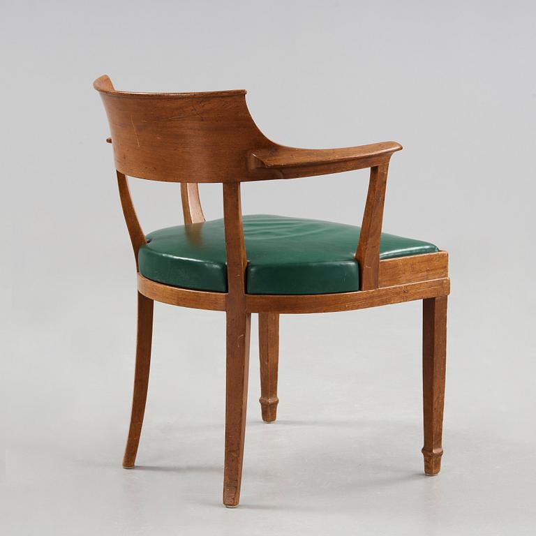 Alfred Grenander, a mahogany and green leather armchair, ca 1905.