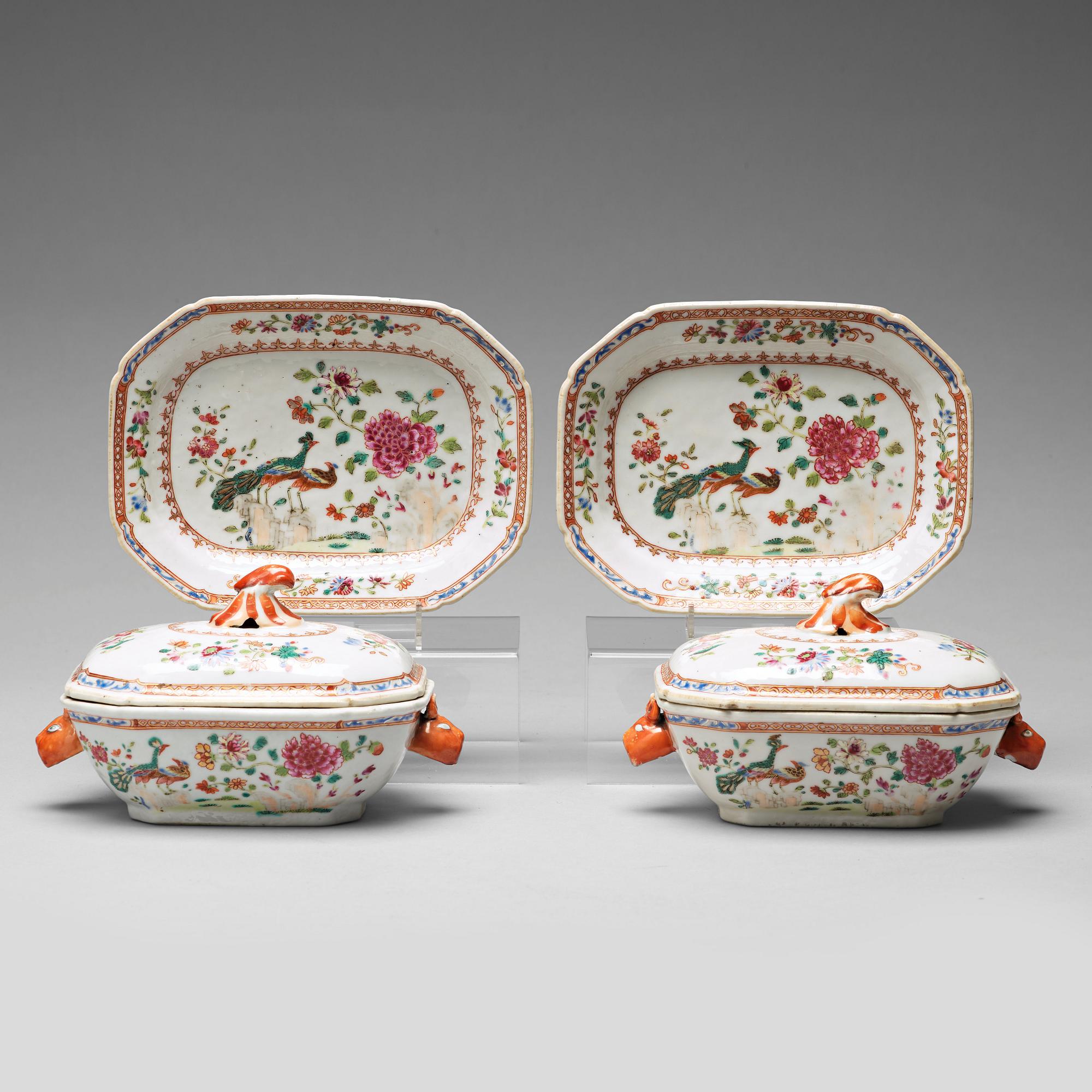 A pair of famille rose 'double peacock' butter tureens with covers and stands, Qing dynasty, Qianlong (1736-95).