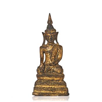 1255. A gilt bronze figure of Buddha, Burma, Shan-state, 18th century.