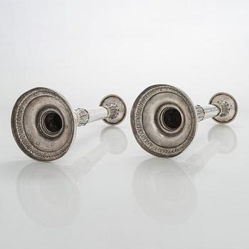 A pair of Empire silver candlesticks, Northern Europe, first half of the 19th century.
