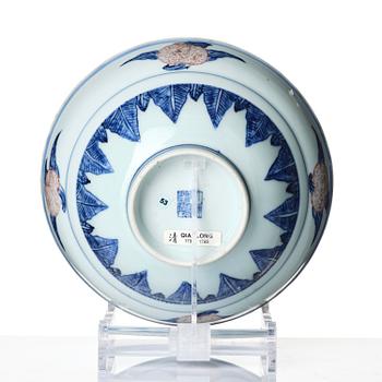 A blue and white and copper-red 'peaches' bowl, Qing dynasty.