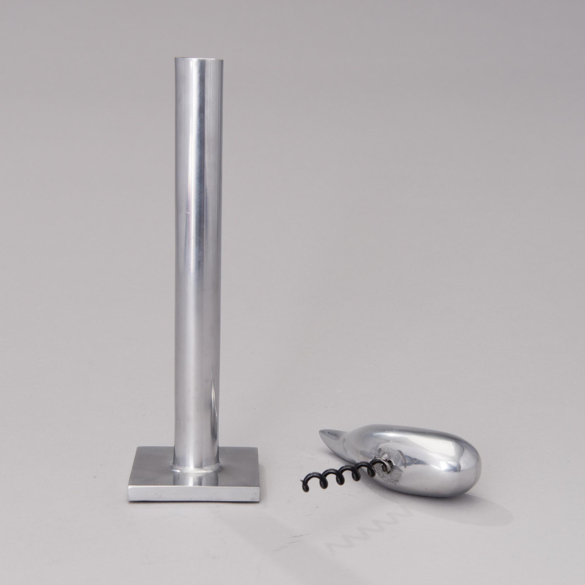 A pair of Chab Wellington coat hooks, a Smoki Christiani cork screw and a Picfeu fireplace poker. Late 1980s.