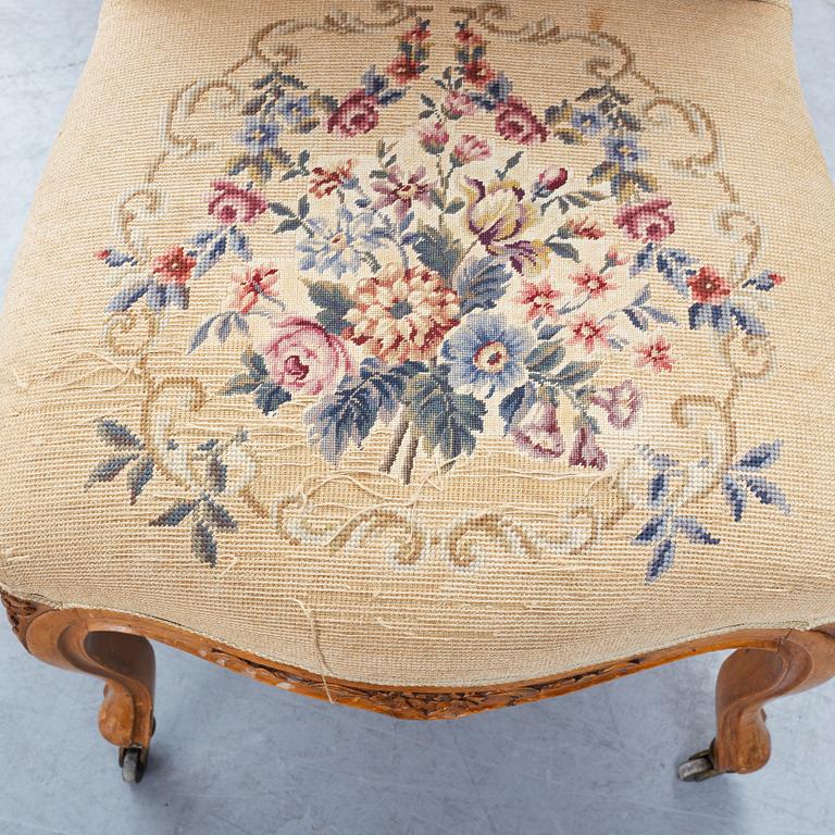 A set of sofa, two armchairs and six chairs, Louis XV-style, ca 1900.