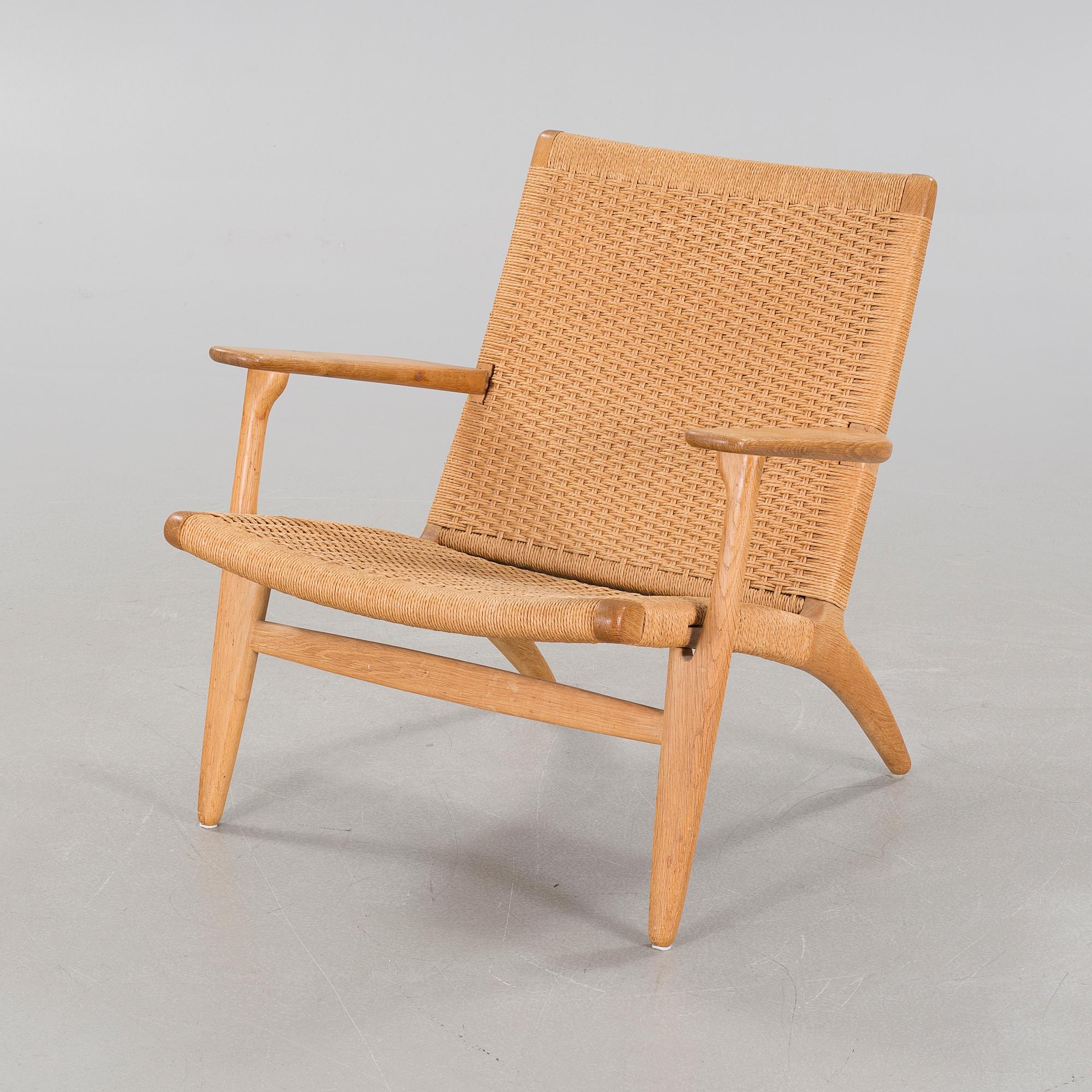 A lounge chair by Hans J Wegner, model "CH-25", for Carl Hansen & Son, Denmark, second half of the 20th century.