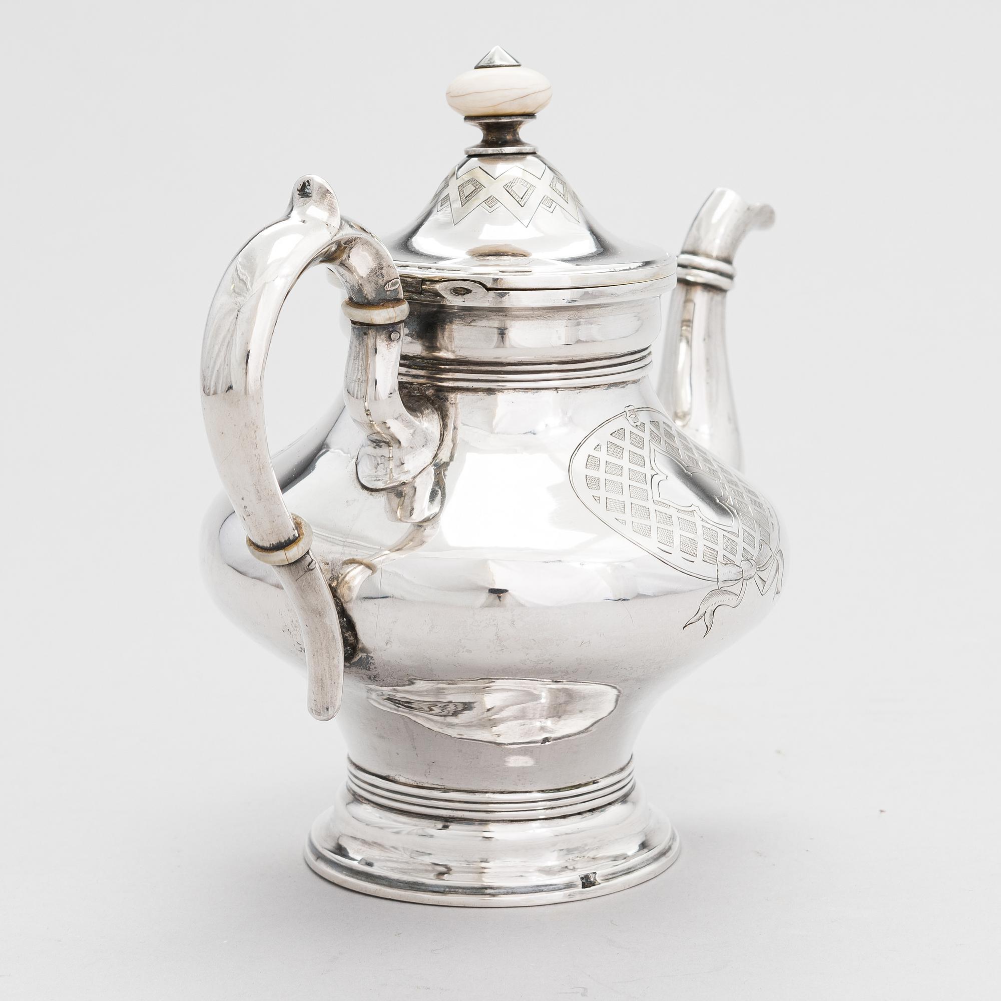A Russian silver teapot, maker's mark of Andrei Wilgelmovich Wekman, Moscow 1871.