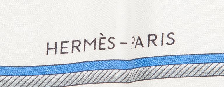 Hermès, a 'Les Voitures à Transformation' silk scarf.
