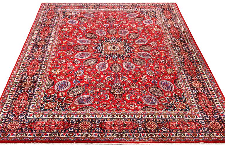 A Keshan carpet, c. 355 x 245 cm.