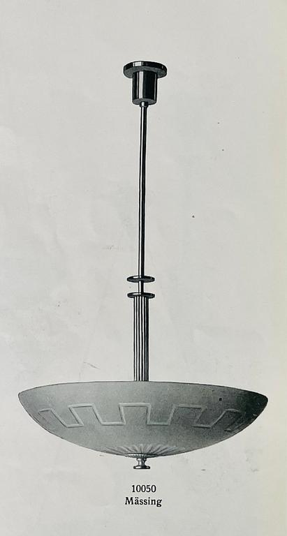 Harald Notini, a table lamp model "6944" with glass shade model "10050", Arvid Böhlmarks Lampfabrik, 1920s-1930s.