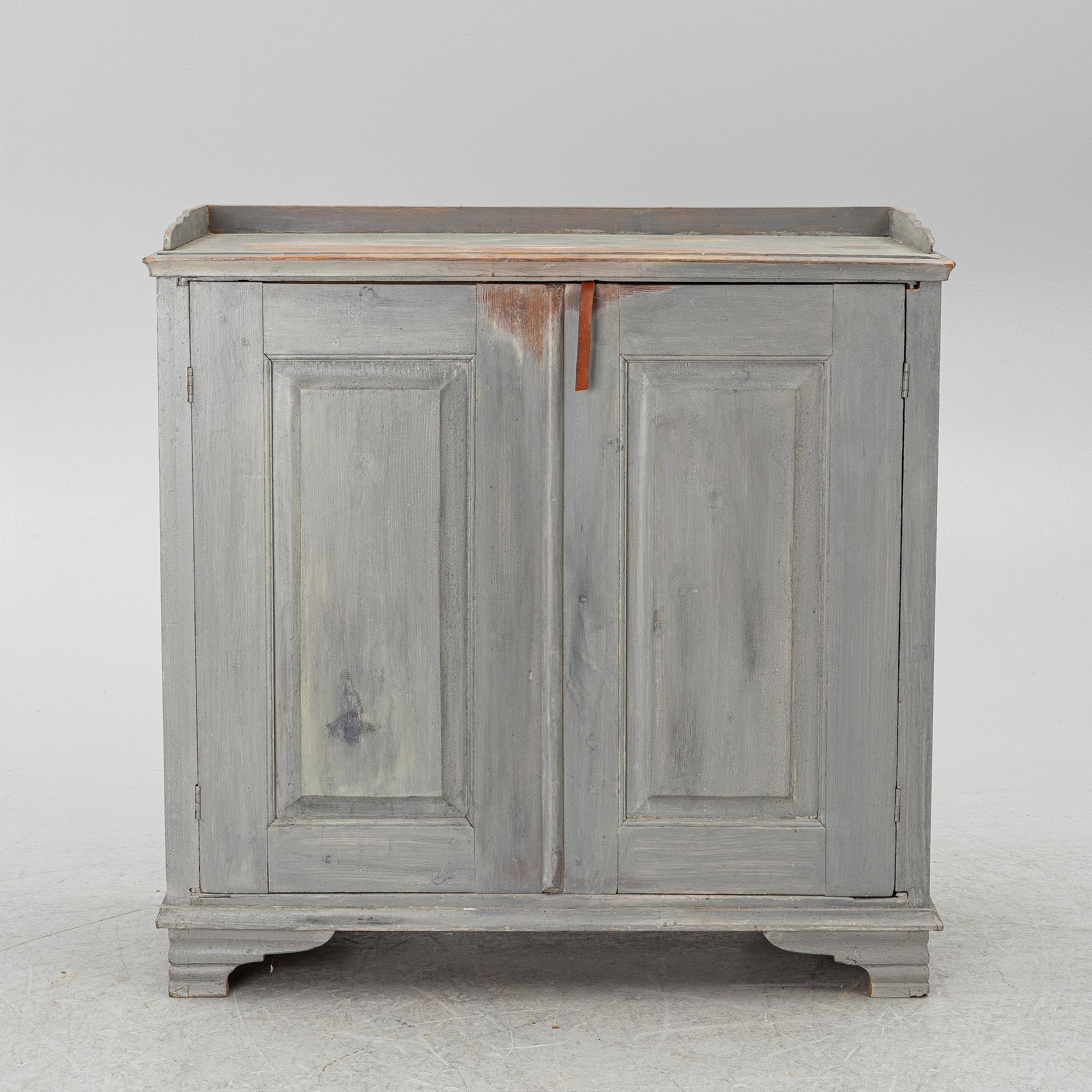 A Gustavian cupboard, circa 1800.