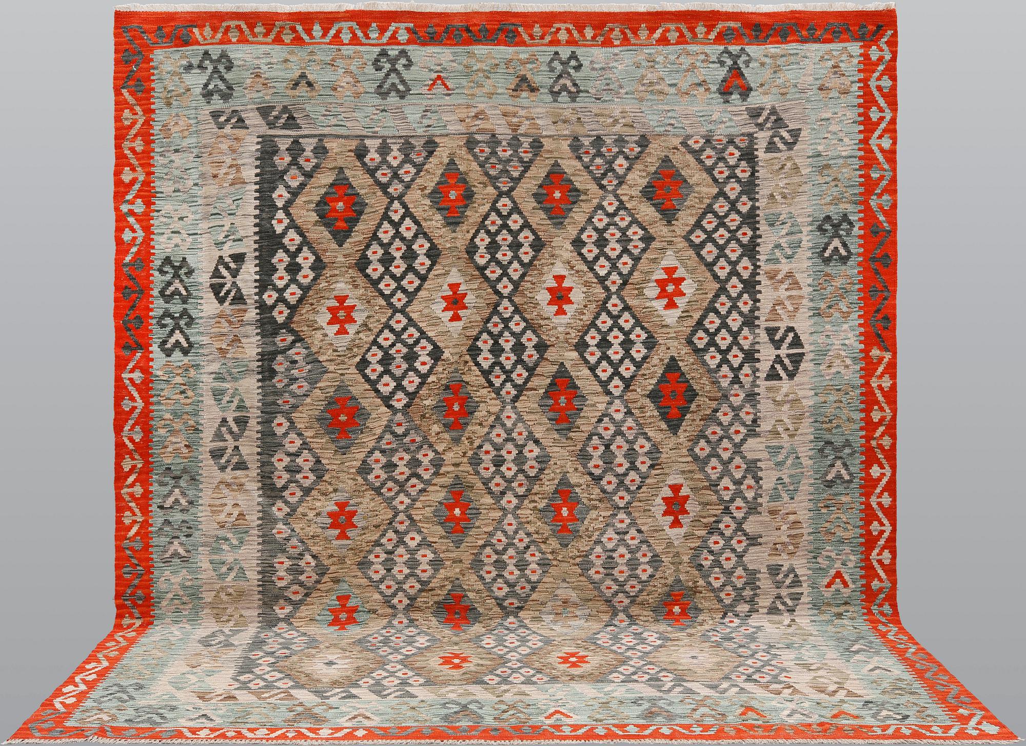 A Kilim carpet, ca 292 x 261 cm.