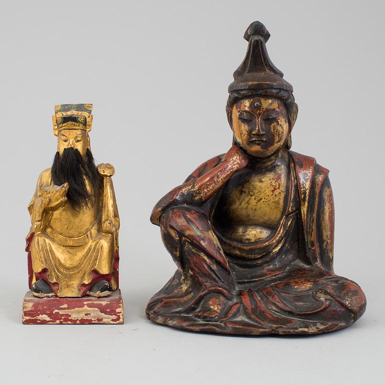 A pair of lacquered wooden deities, late 19th Century.