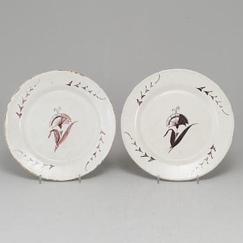A Swedish faience serving dish and six plates, 18th Century.