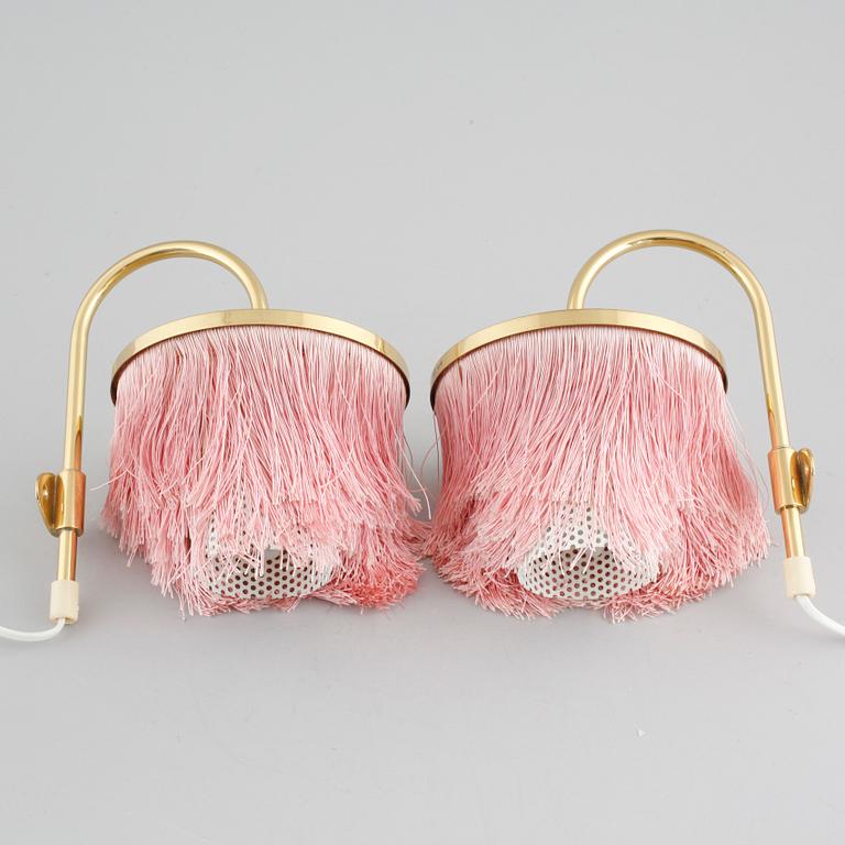 A pair of wall lamps by Hans-Agne Jakobsson for Markaryd from the second half of the 20th century.