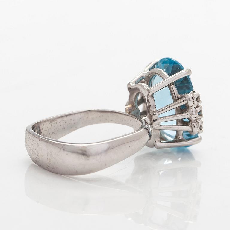 An 18K white gold ring with aquamarine and brilliant-cut diamonds, Conti, South Africa.
