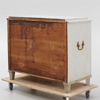 A chest of drawers, circa 1900.