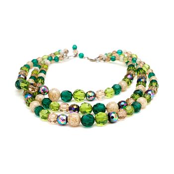 CHRISTIAN DIOR, a green three strand glass beaded necklace.