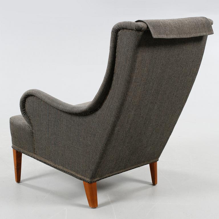 A chair, model Oscar, designed by Carl Malmsten for Carl Malmsten AB, bought 31 of January 1962.