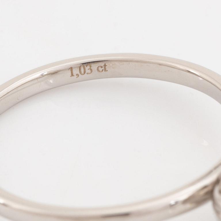 Cushion cut diamond ring.