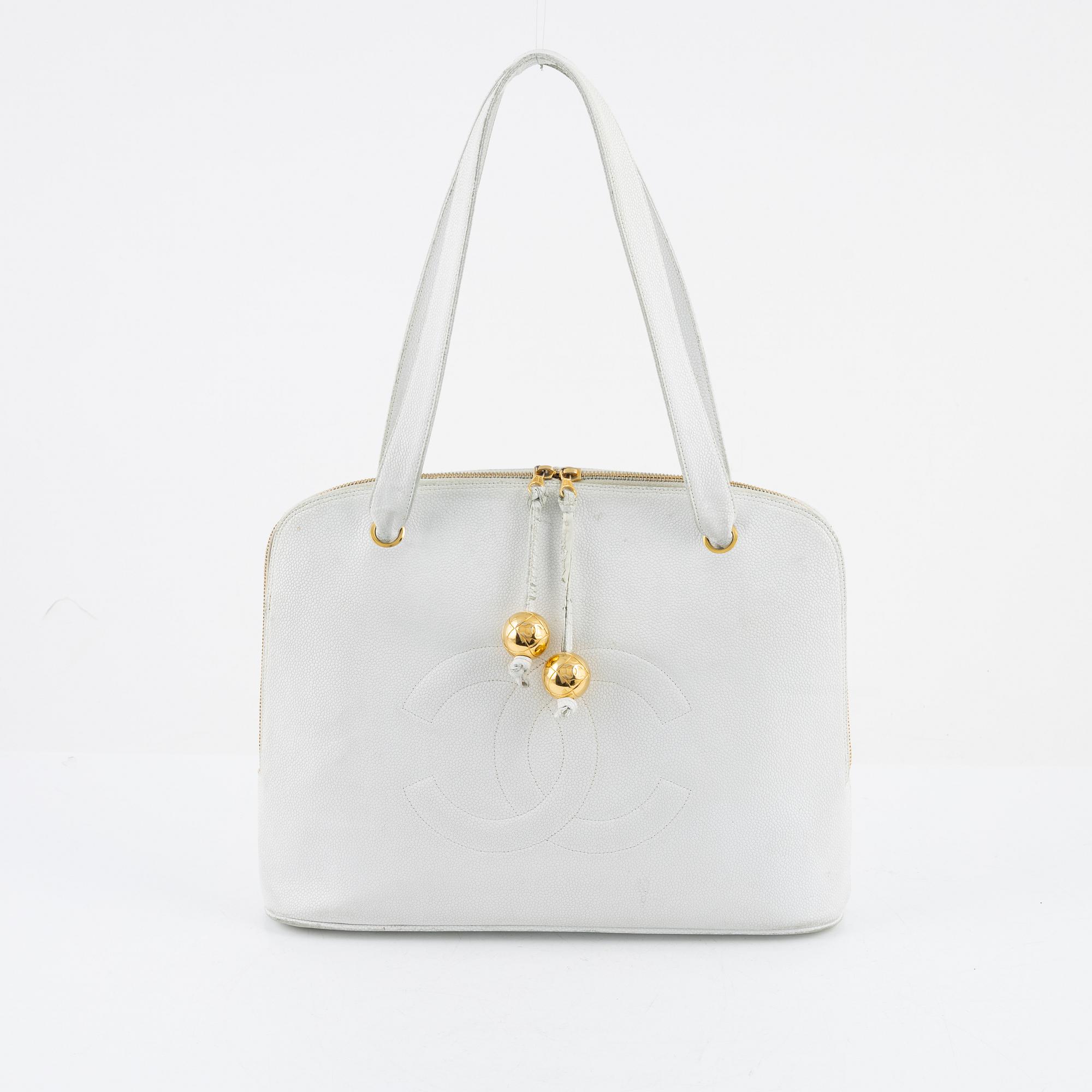 Chanel, a white caviar vintage bag.