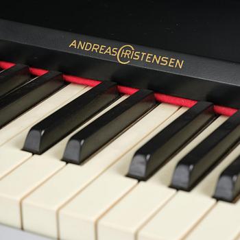 Poul Henningsen, a "PH Upright Piano", executed by Andreas Christensen, Denmark, 1940s.