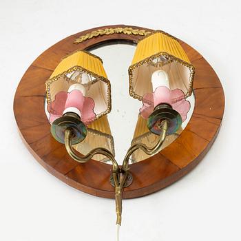A pair of Swedish Empire mirror sconces, first half of the 19th century.