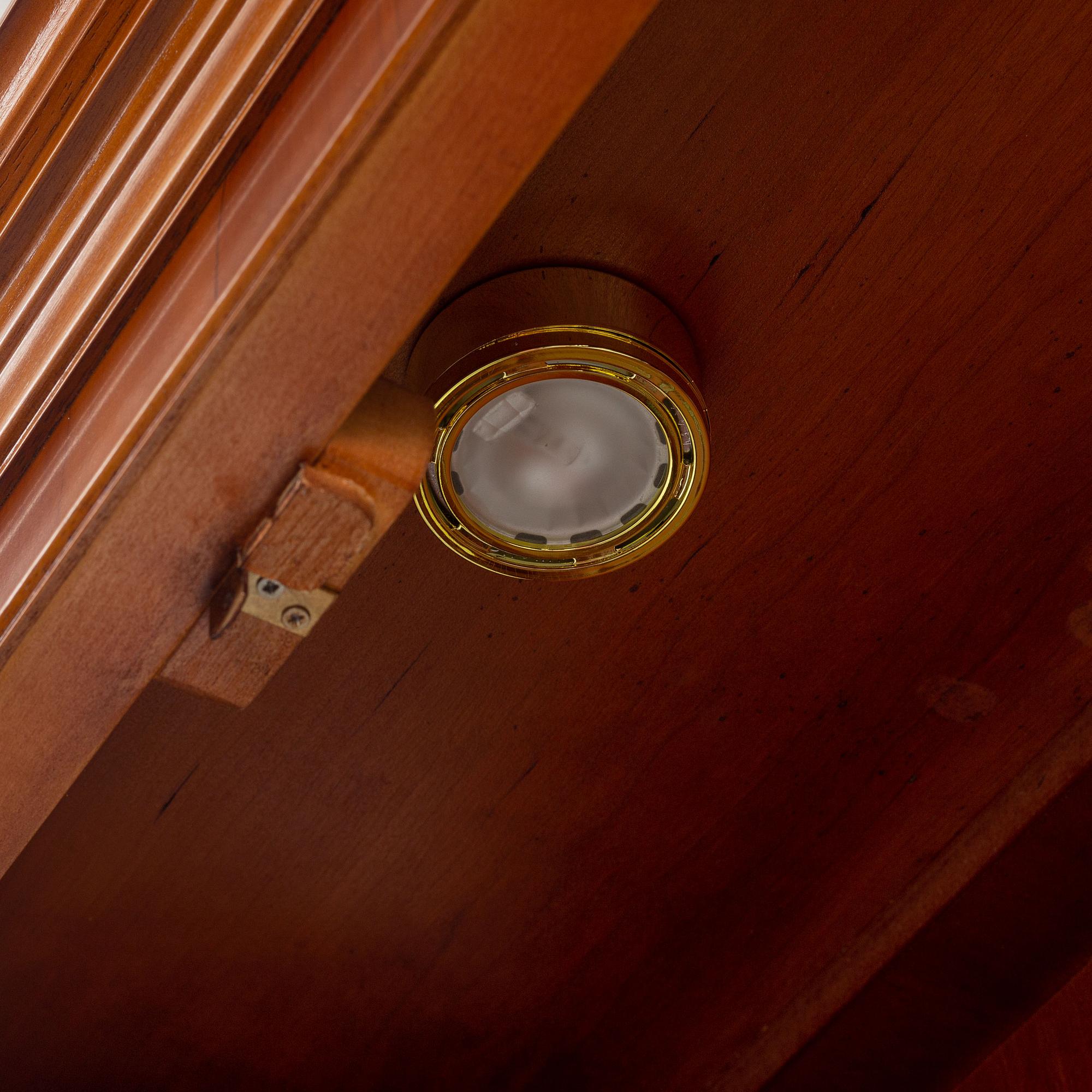 An English yew cabinet, 21st Century.