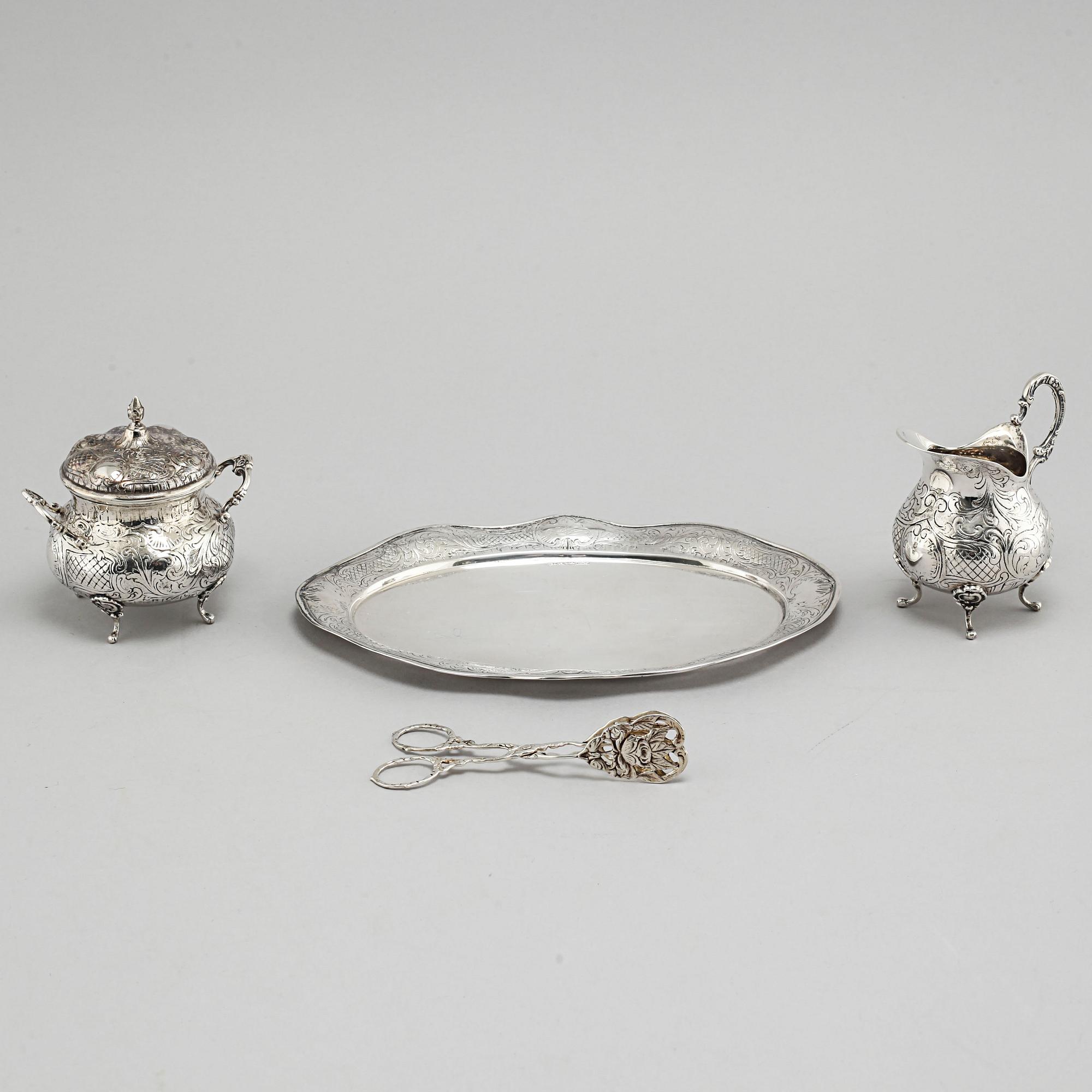 A silver sugarbowl, a cream jug and a tray by J L Hultman, Stockholm, mid 20th century.